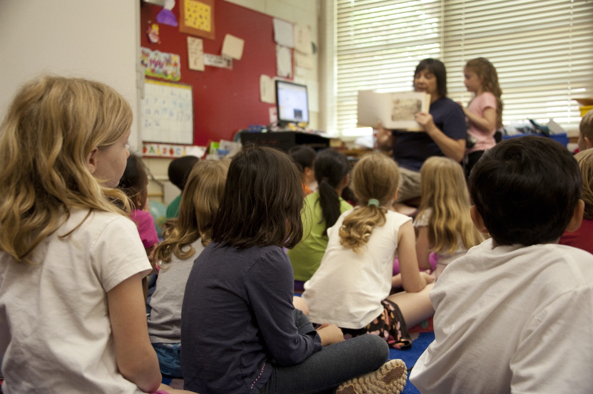 Teacher school reading children